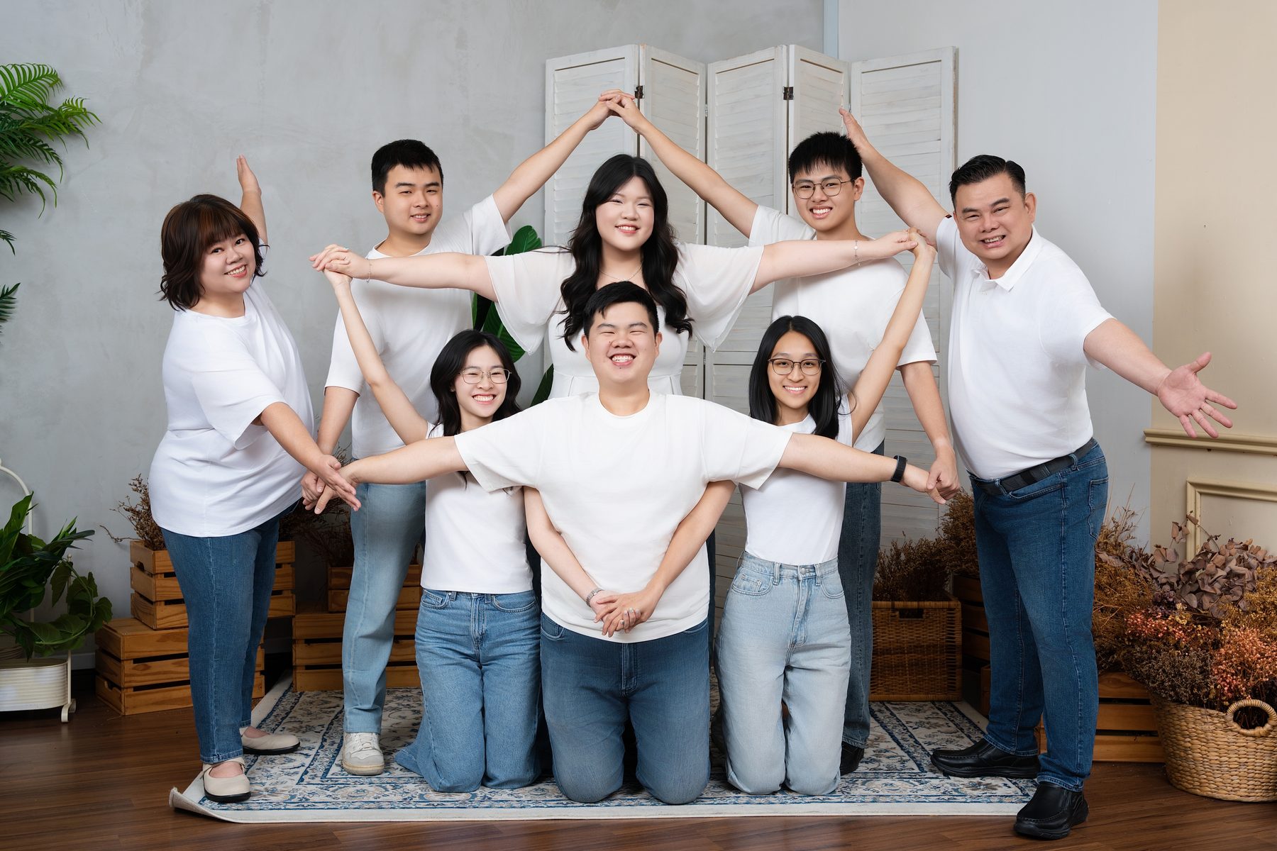 Premo Studio real client family portrait — extended family group, warm tones