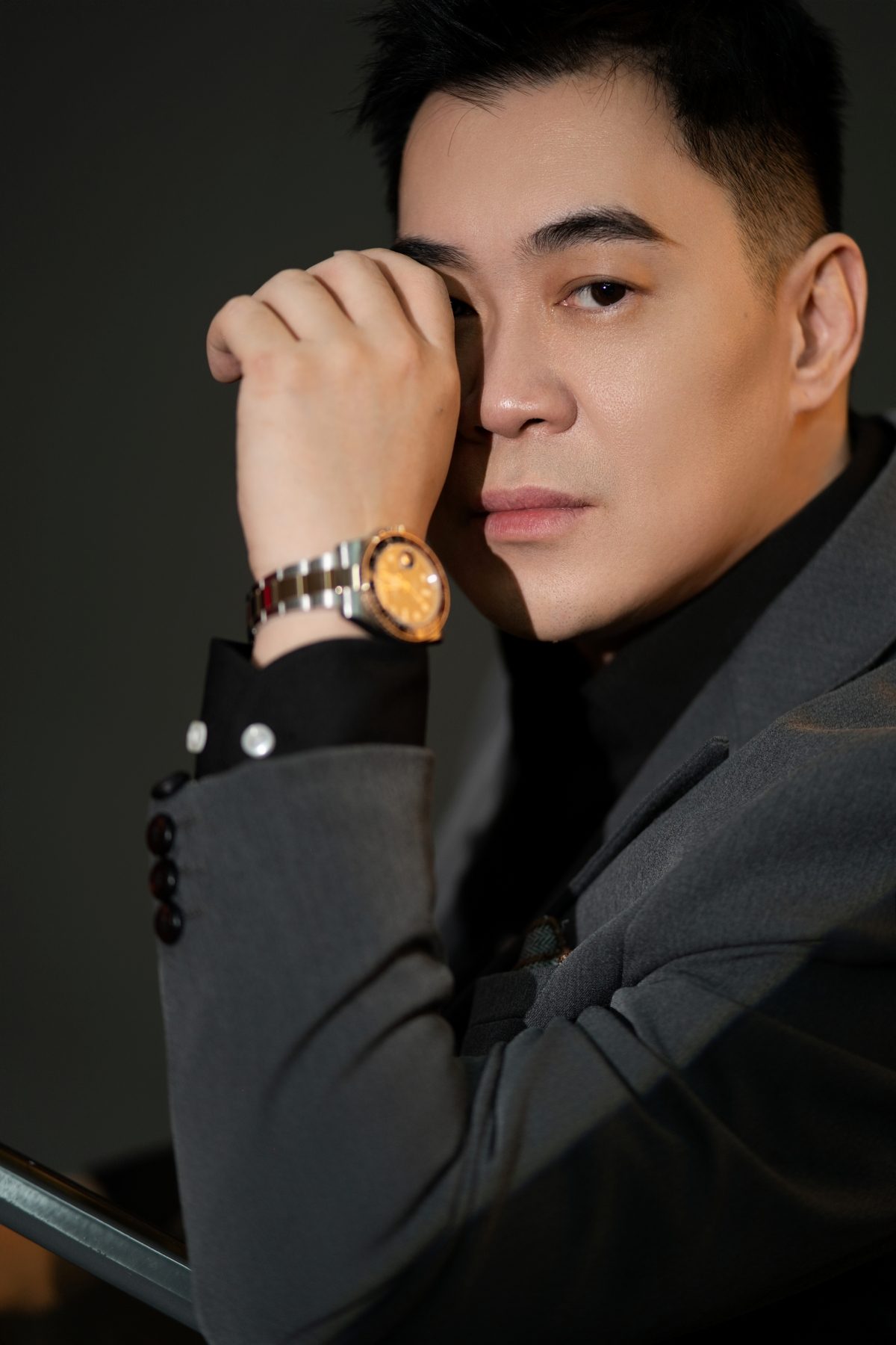 Premo Studio real client business portrait — man, dramatic studio lighting